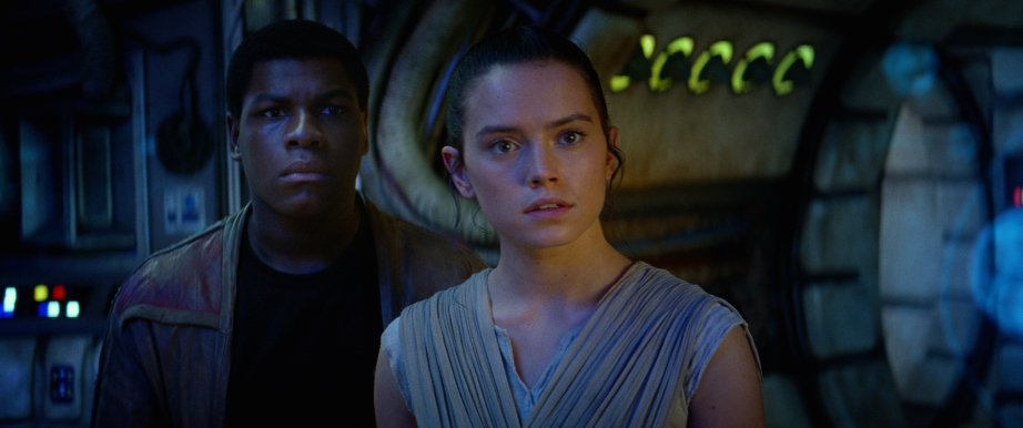 Star Wars: The Force Awakens L to R: Finn (John Boyega) and Rey (Daisy Ridley)